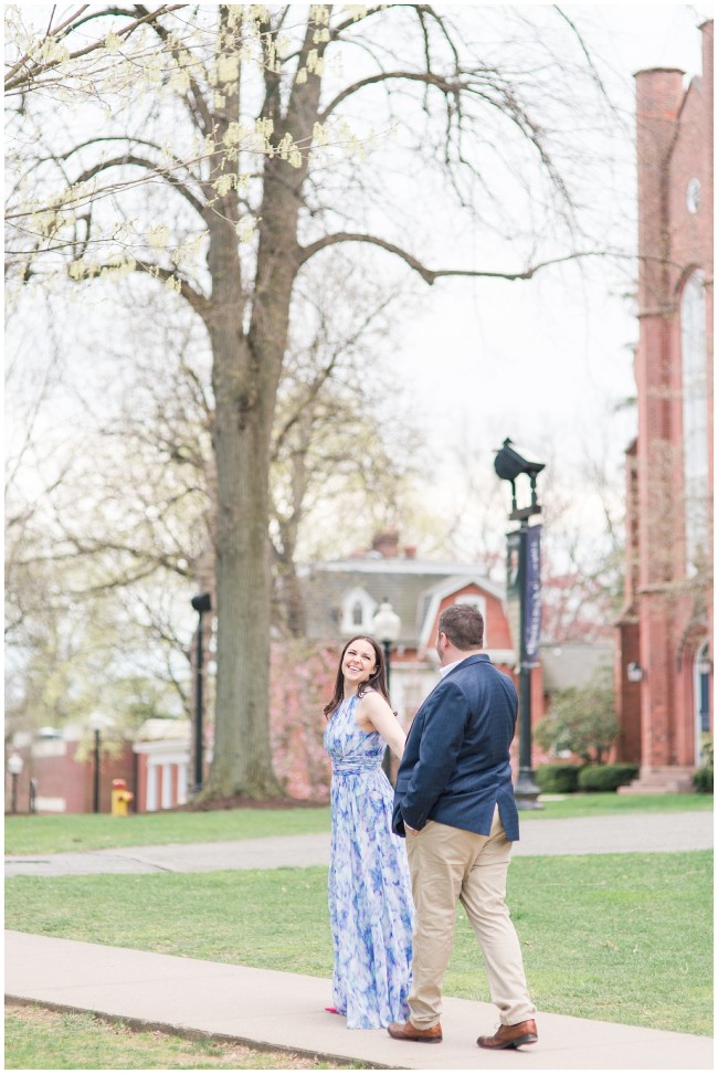 Engaged couple walking through the Franklin and Marshall College campus