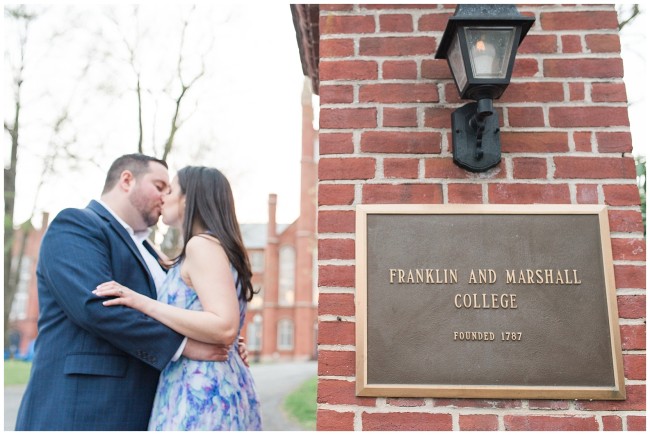 Couple kissing for engagement pictures at  Franklin and Marshall College in Lancaster PA