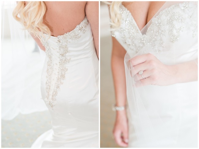 Closeup of brides dress, ring, and veil at Mallard Island Yacht Club