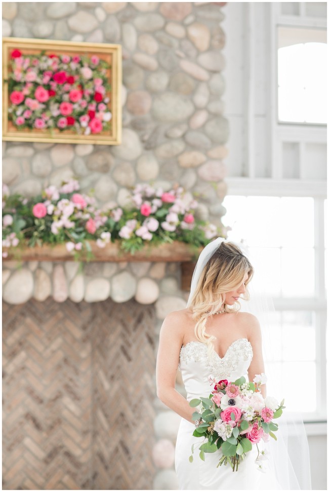 Beautiful blonde bride in wedding gown at Mallard Island Yacht Club