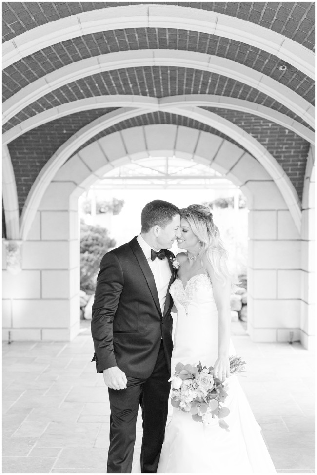 Sweet black and white photo of bride and groom at Mallard Island Yacht Club NJ