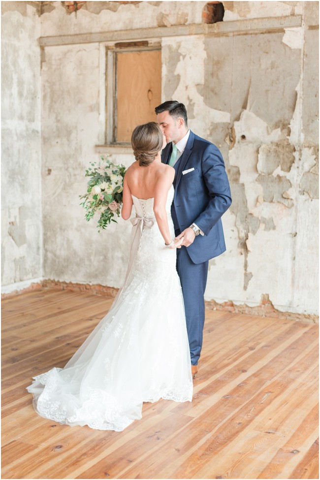 bride and groom kiss at lancaster wedding venue