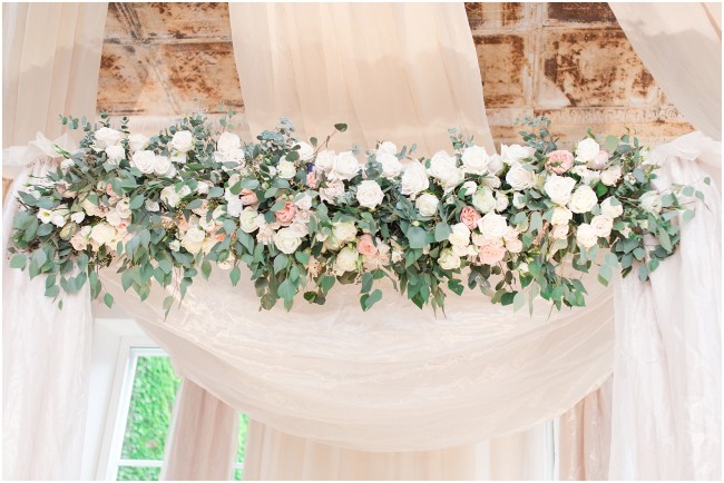 jewish chuppa, floral overhang at excelsior wedding ceremony, eucalyptus and roses ceremony floral detail