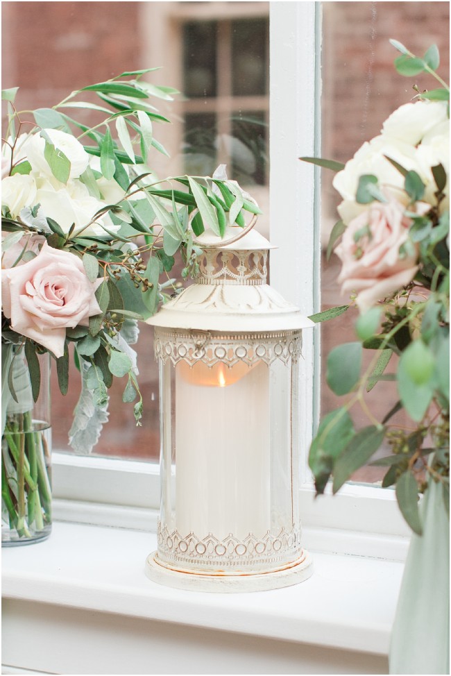 chic and vintage candle lantern on window sill
