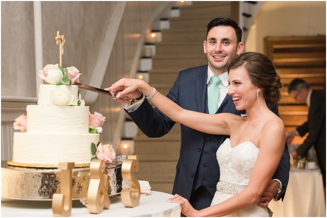 bride and groom cutting their cake at excelsior wedding venue in PA
