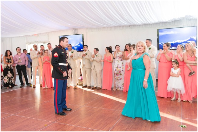 groom in marine corps dress blues dance with mother