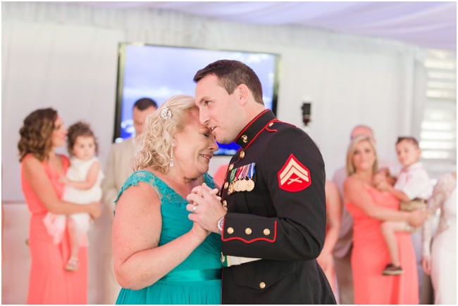 groom in marine corps dress blues dancing with his mother