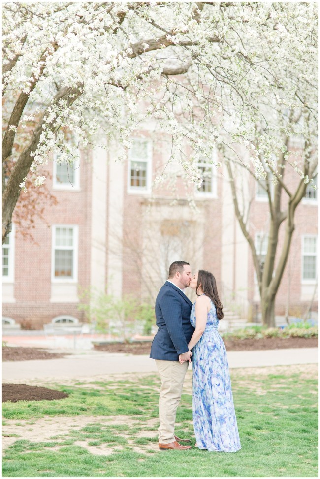 Couple under the cherry blossom trees at Franklin an dMarshall College in Lancaster PA