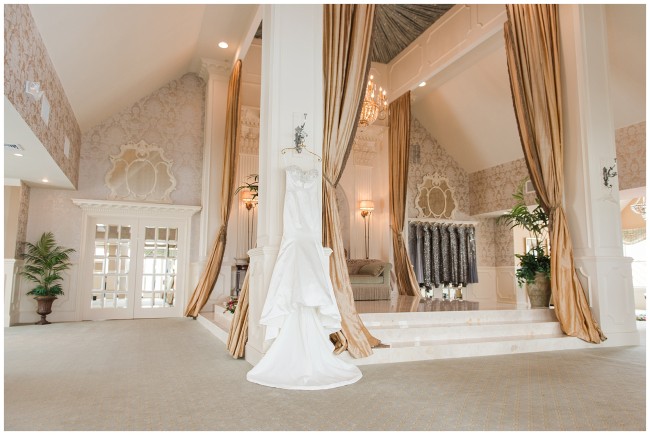 Wedding gown hanging in bridal suite at Mallard Island Yacht Club