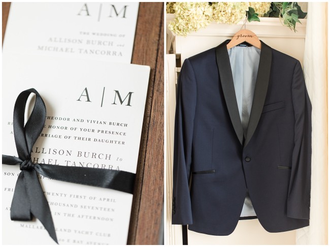 Grooms navy suit and invitation