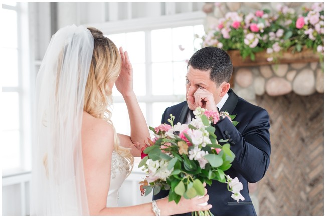 Groom crying after seeing his bride at their first look. Mallard Island Yacht Club