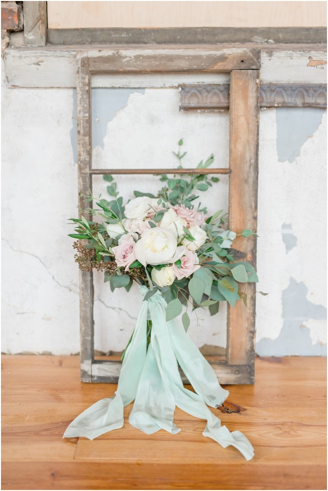 rustic bouquet with mint silk ribbon and old window pane