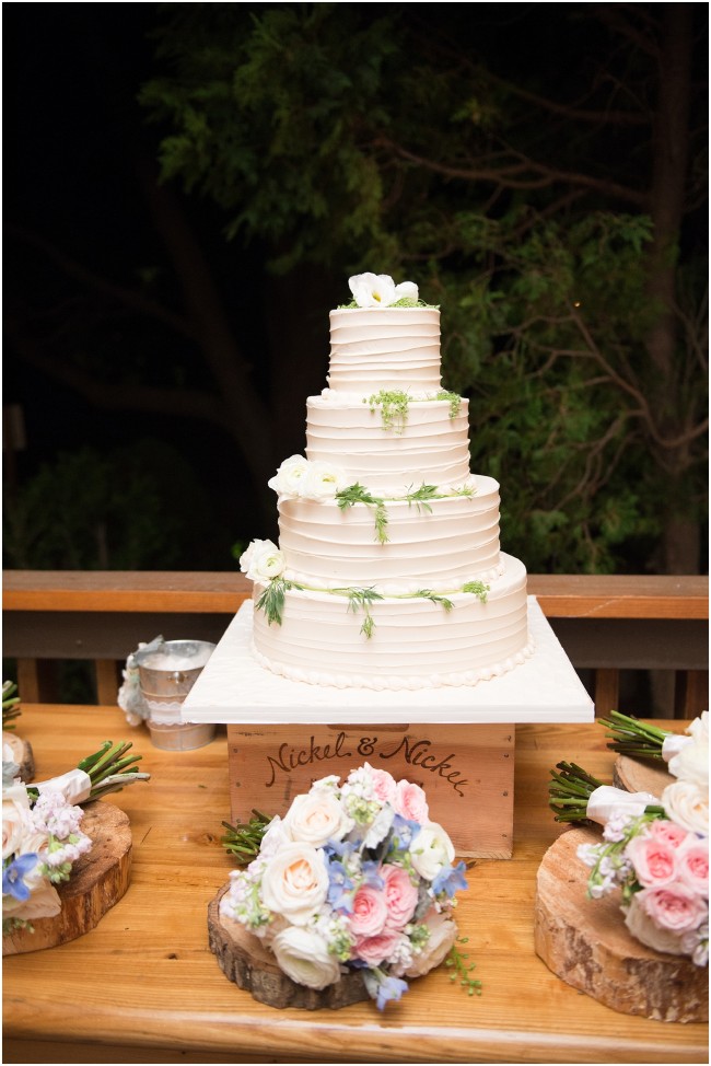 Vanilla with alternating tiers of strawberry and hazelnut fudge filling, four tiered wedding cake