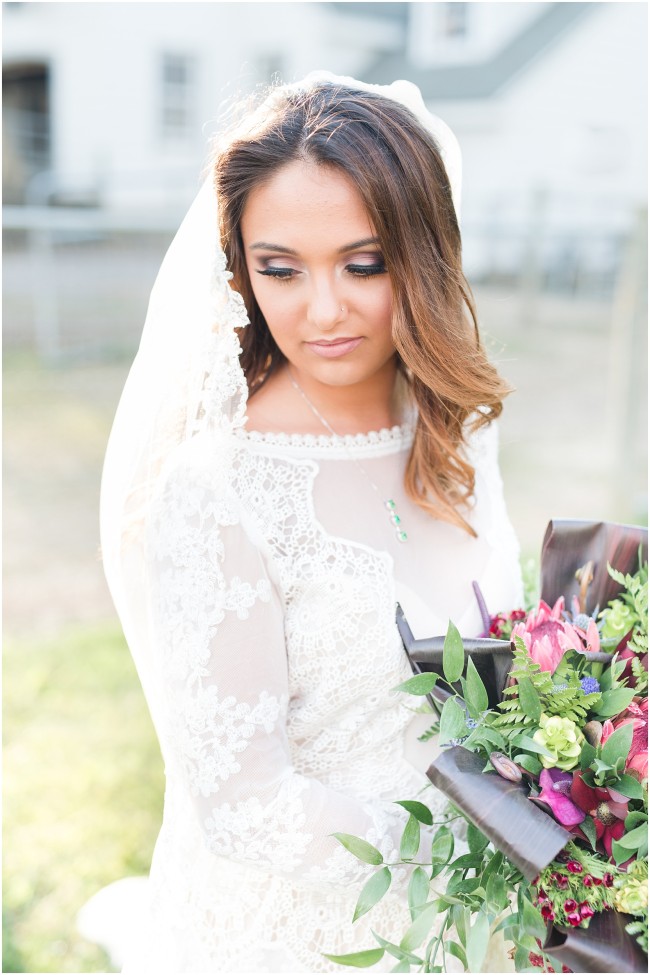 jewel toned wedding makeup, long sleeve lace wedding gown detail