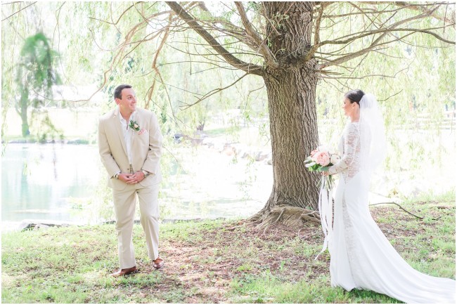 bride and groom first look under a weeping willow tree, grooms reaction in first look photos