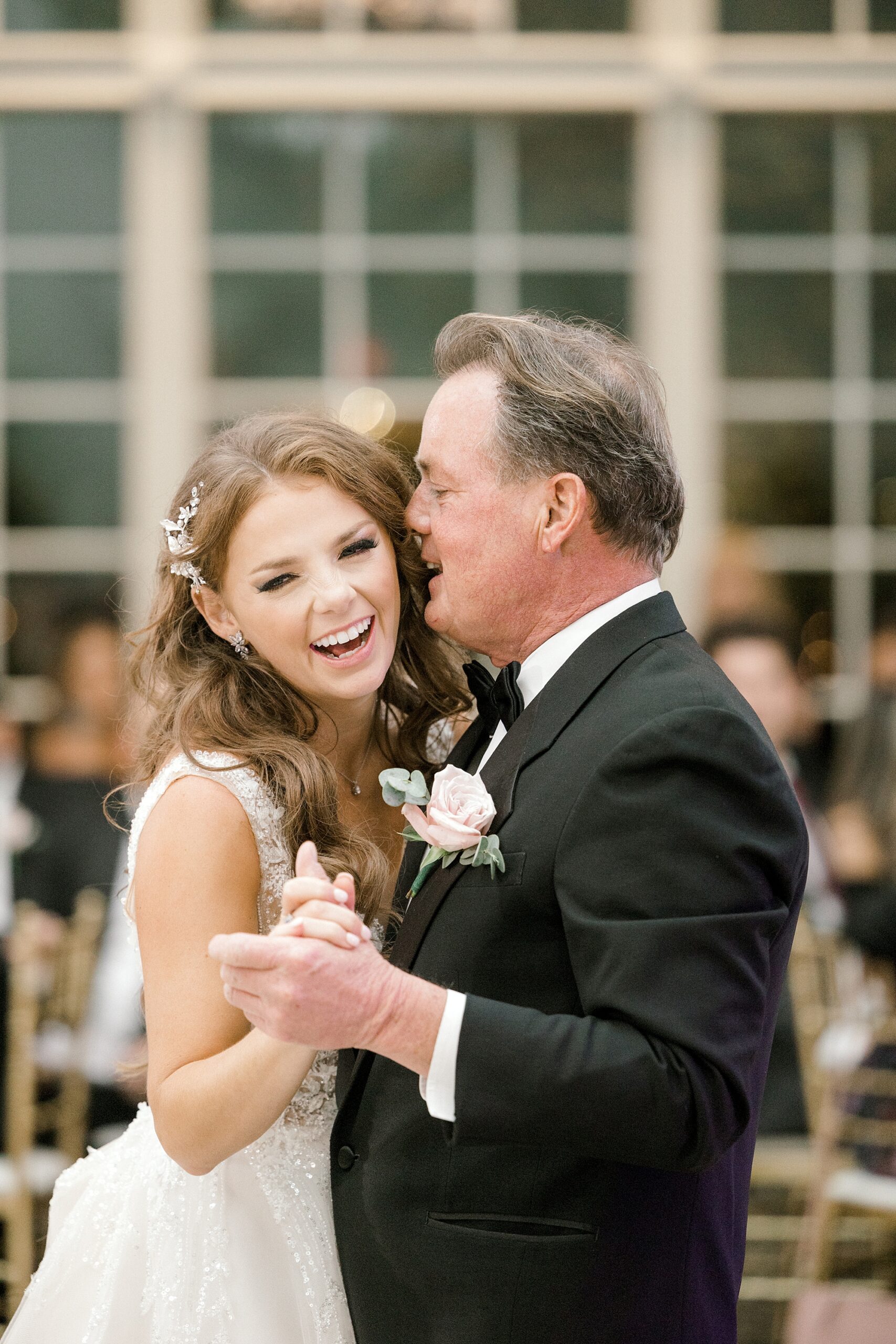 bride laughs with dad during dance at NJ wedding reception