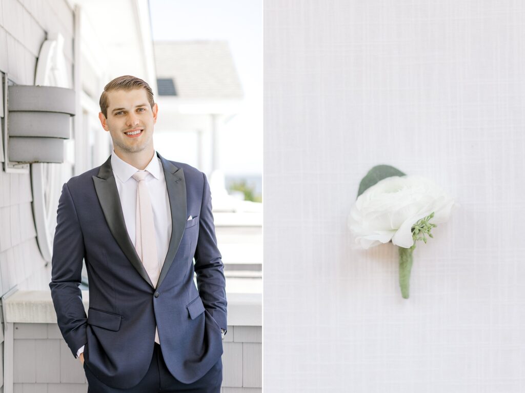 groom stands on front porch of home in Manahawkin NJ in navy suit with pink tie 