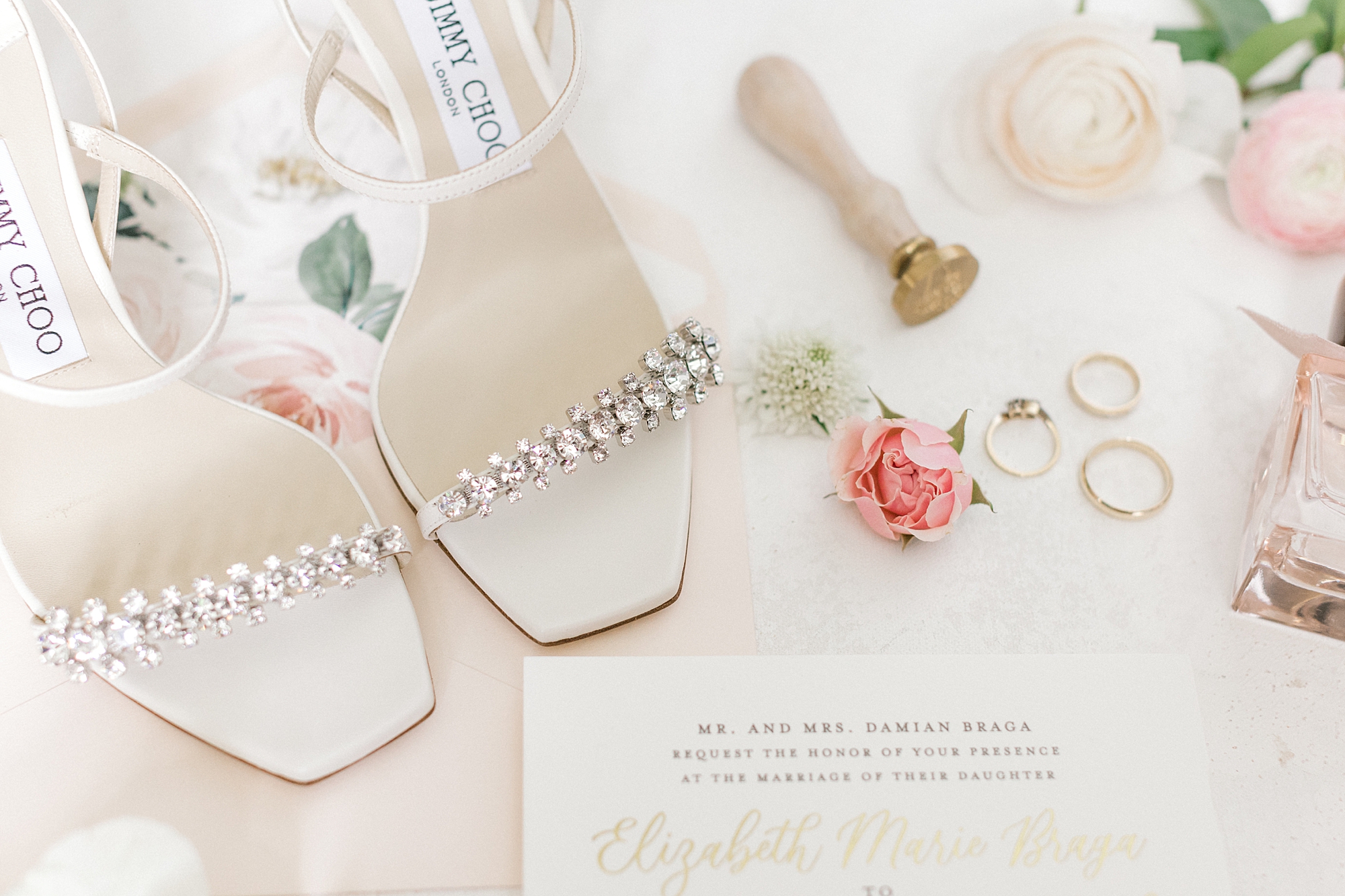 bride's shoes and invitation suite flatlay