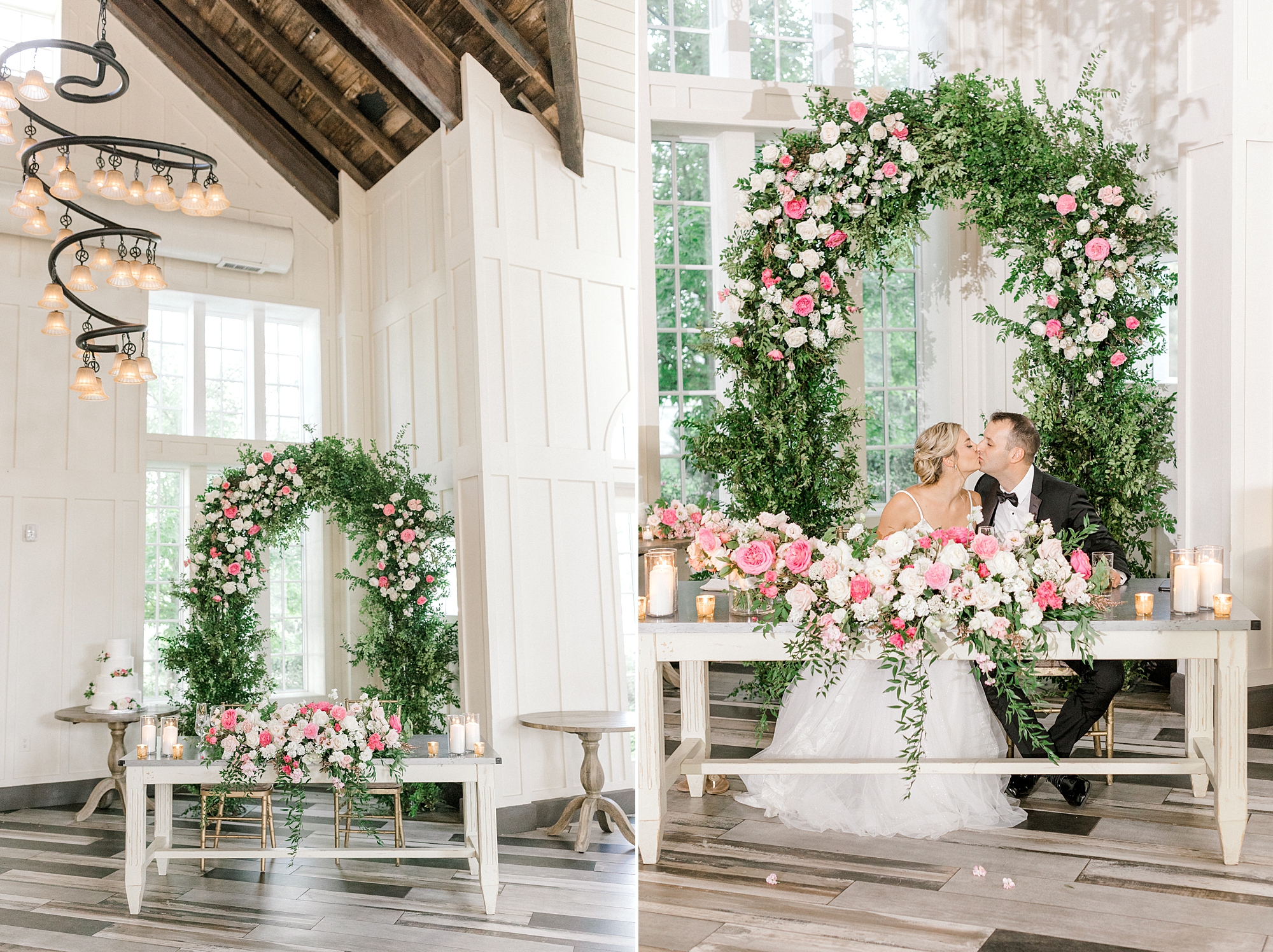 newlyweds kiss under floral arch during reception in ballroom at Ryland Inn