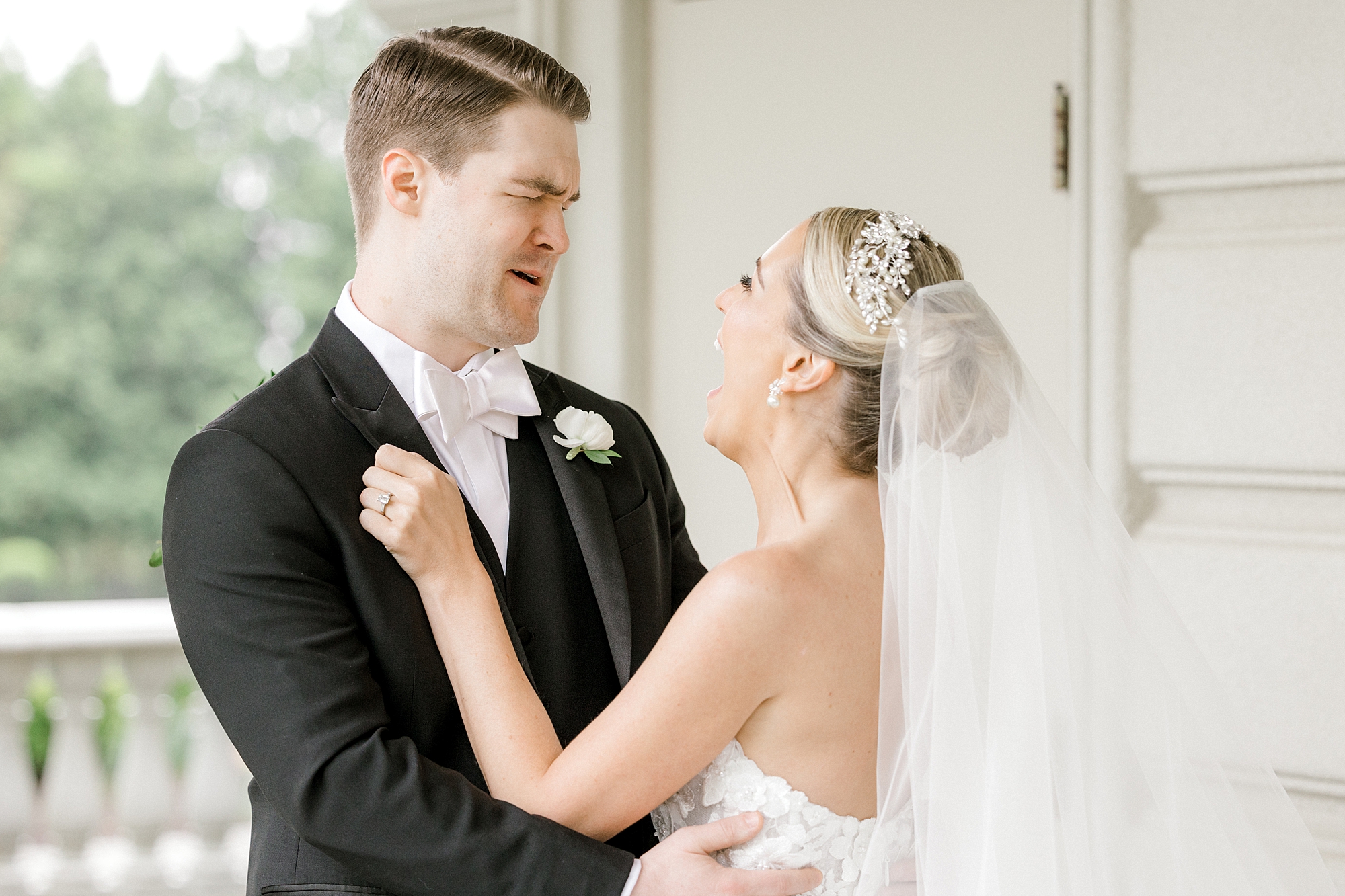 bride and groom laugh hugging during spring photos at the Ashford Estate