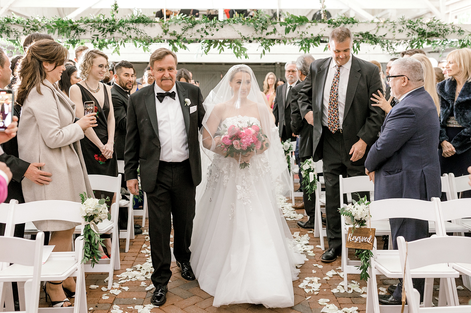 bride and father walk down aisle at The Ashford Estate for wedding ceremony