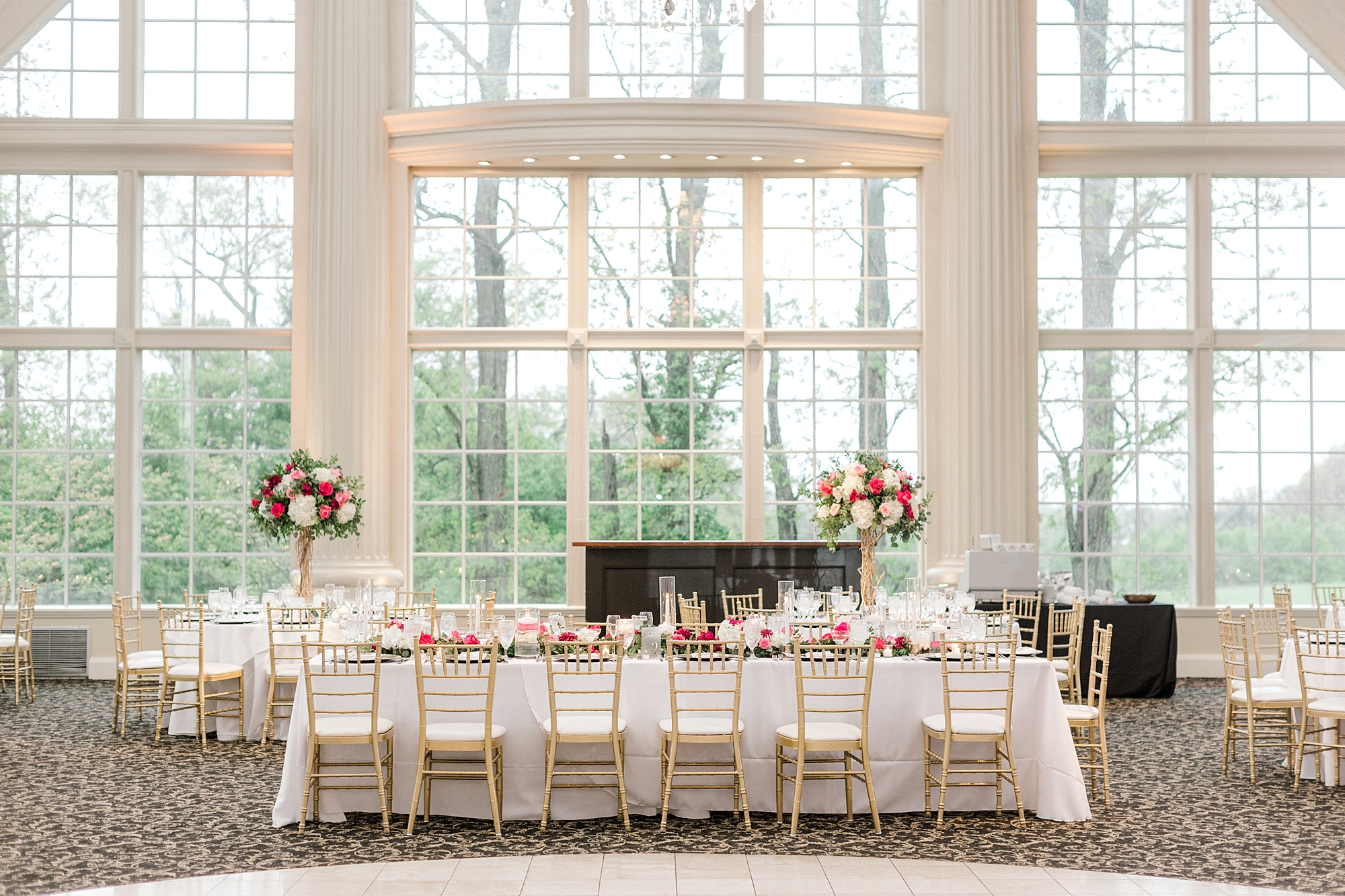 The Ashford Estate wedding reception table with pink floral centerpieces