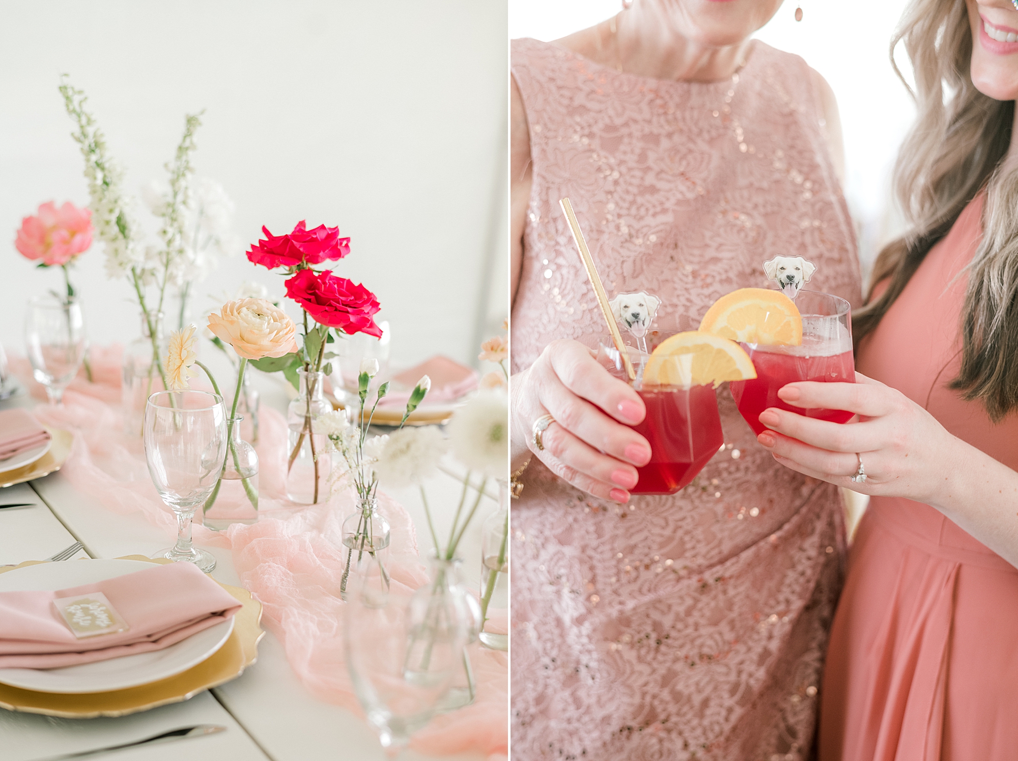women in pink dresses hold cocktails with dog stirrers