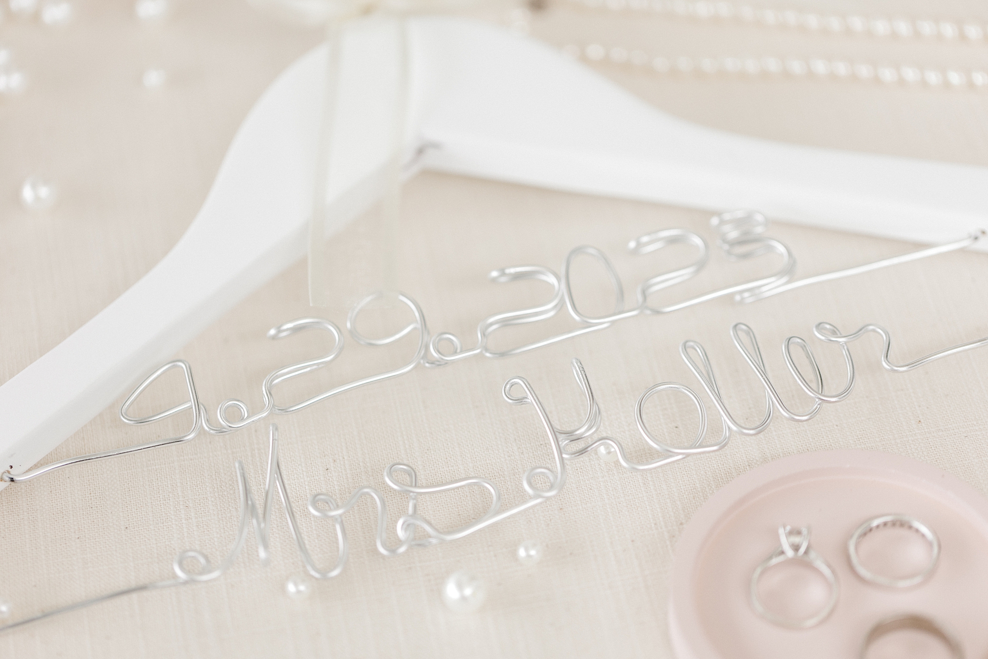 bride's custom hanger for wedding gown