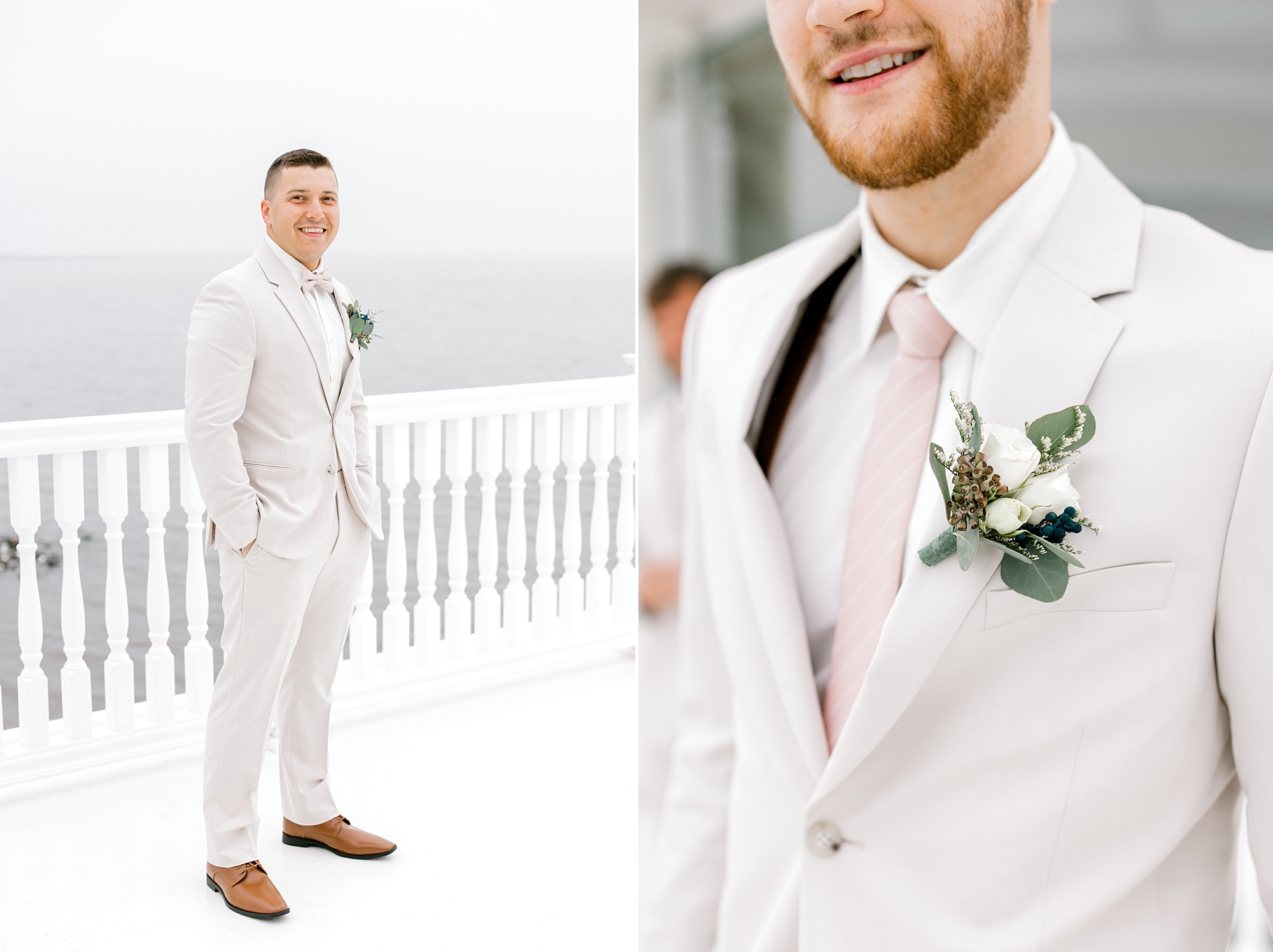 groom stands in ivory suit jacket with white and blue boutonnière paired with pink tie