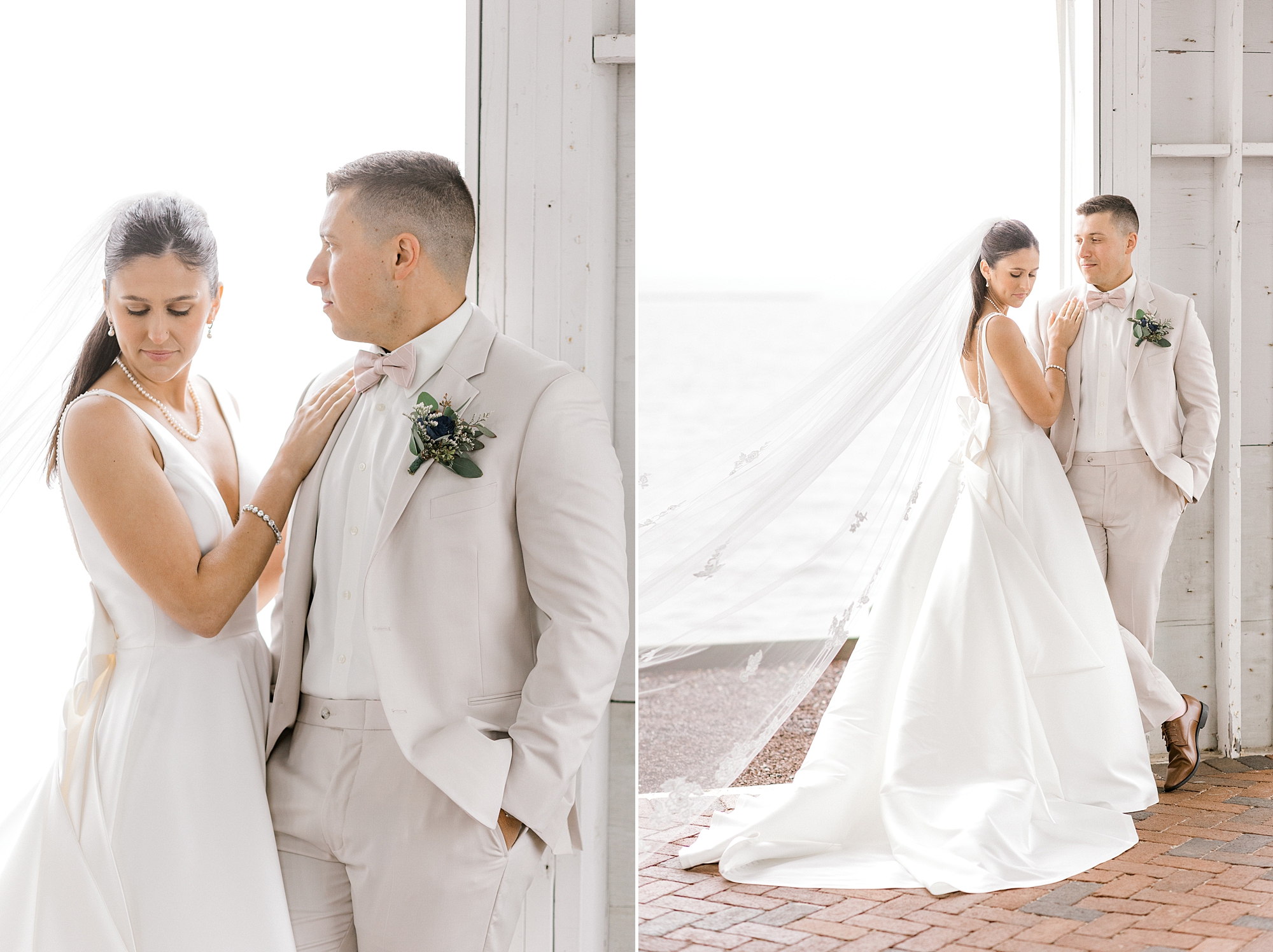 bride and groom stand together by windows at Mallard Island Yacht Club