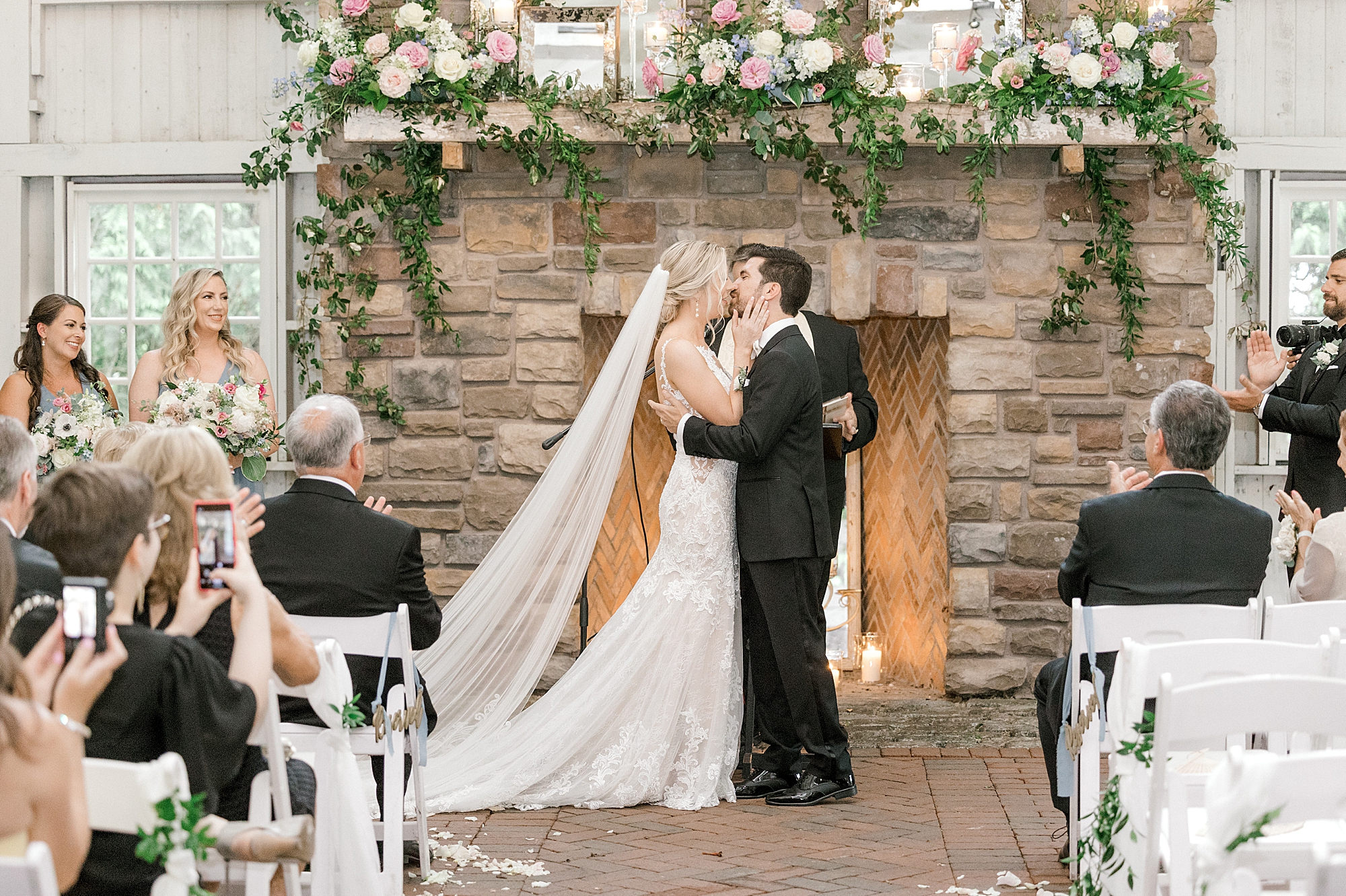 newlyweds kiss during wedding ceremony in New Jersey