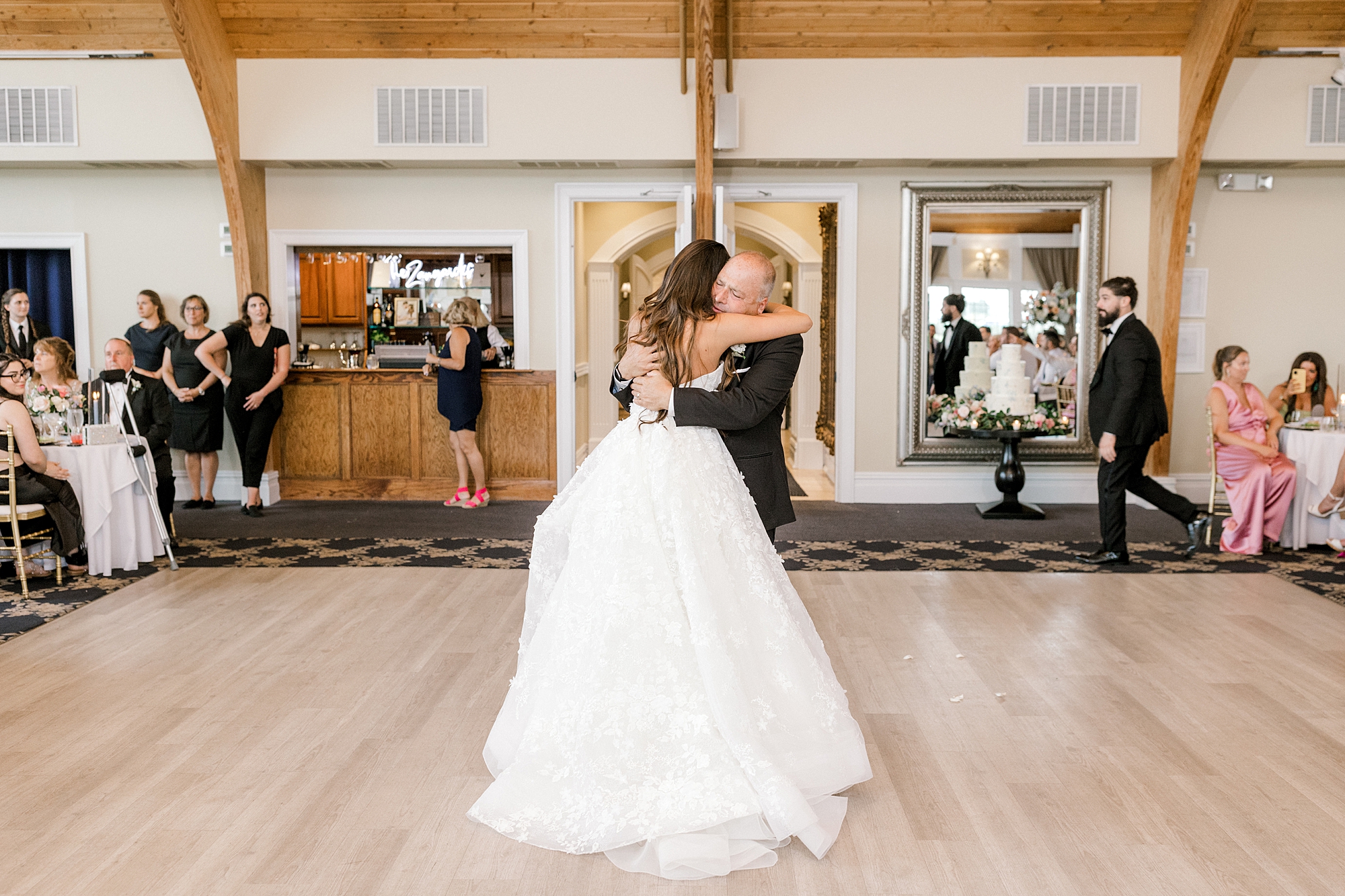 bride hugs father during dance at LBI wedding reception