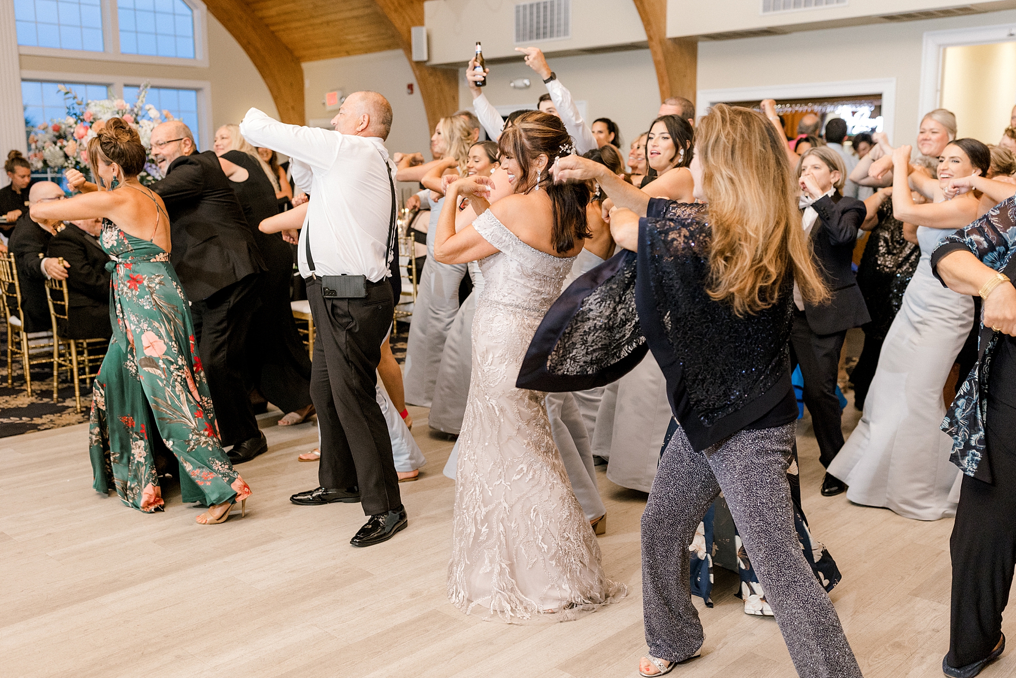 guests participate in flash mob for bride and groom at Bonnet Island Estate wedding reception