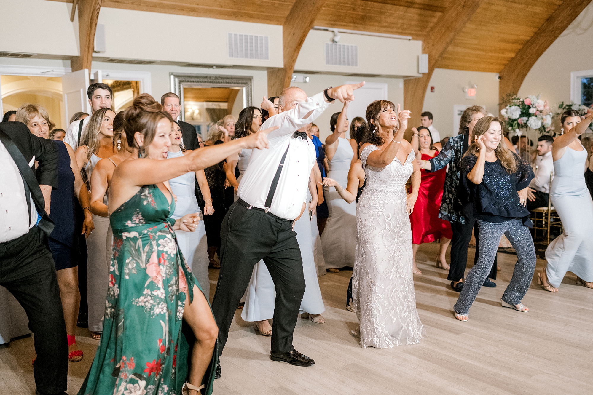 guests participate in flash mob for bride and groom at Bonnet Island Estate wedding reception