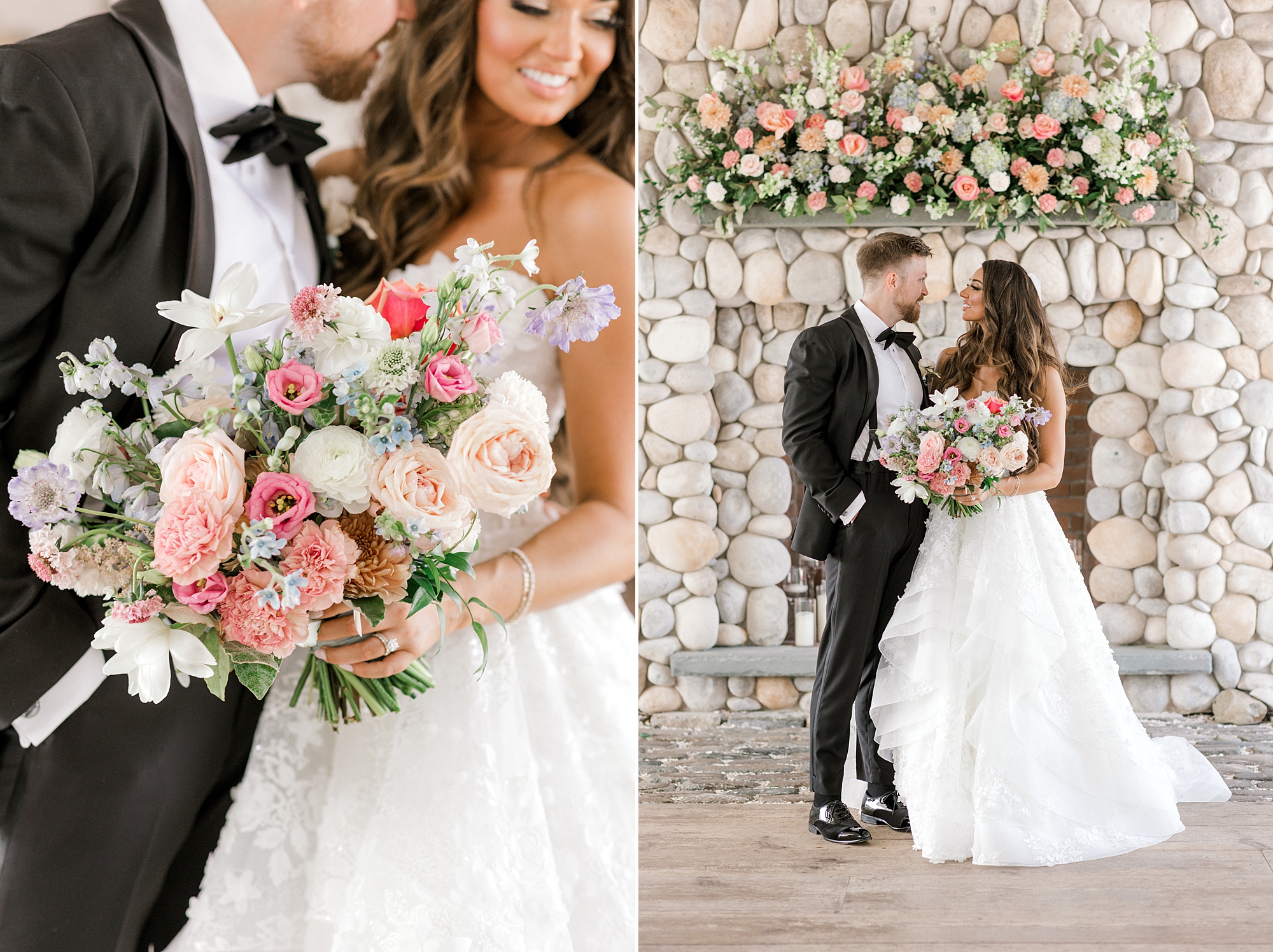 newlyweds hug by stone fireplace covered in white and pink flowers