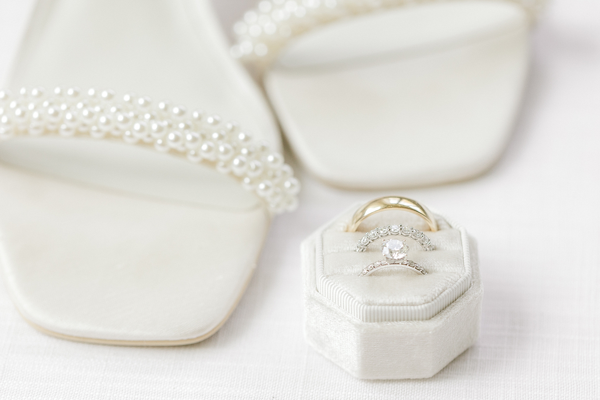 bride's ivory shoes and jewelry box before NJ wedding