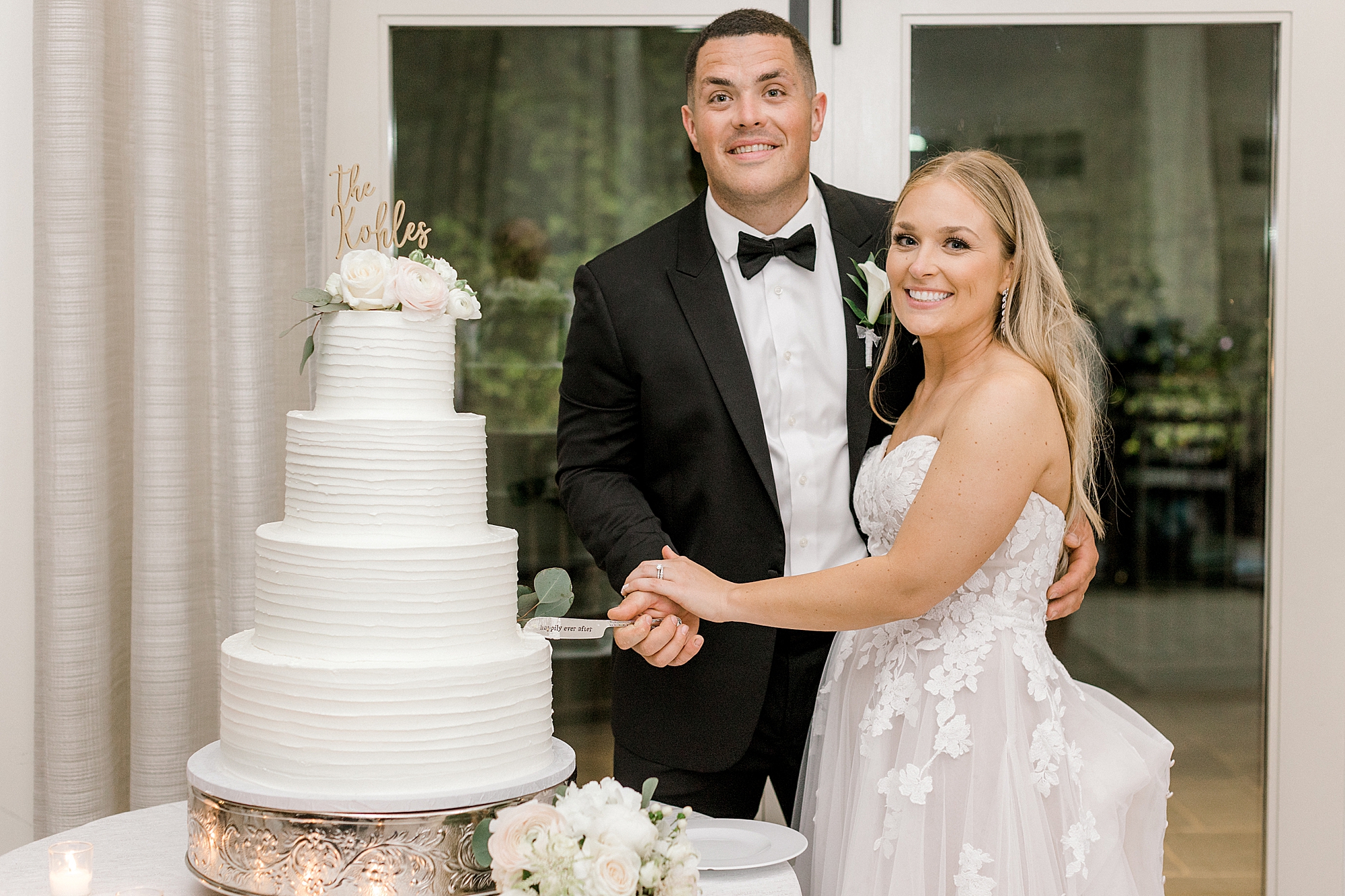 bride and groom cut wedding cake at NJ wedding reception