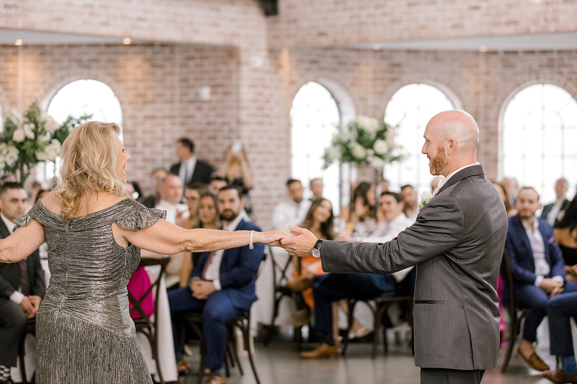 groom twirls mom on dance floor in New Jersey