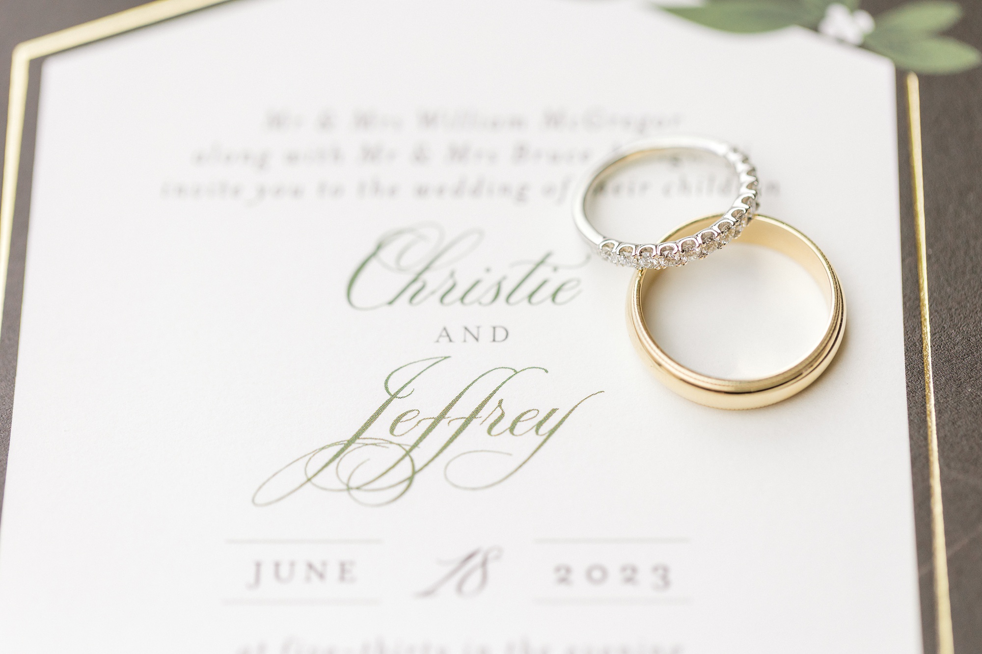 invitation suite with golden rings for summer wedding at Refinery at Perona Farms