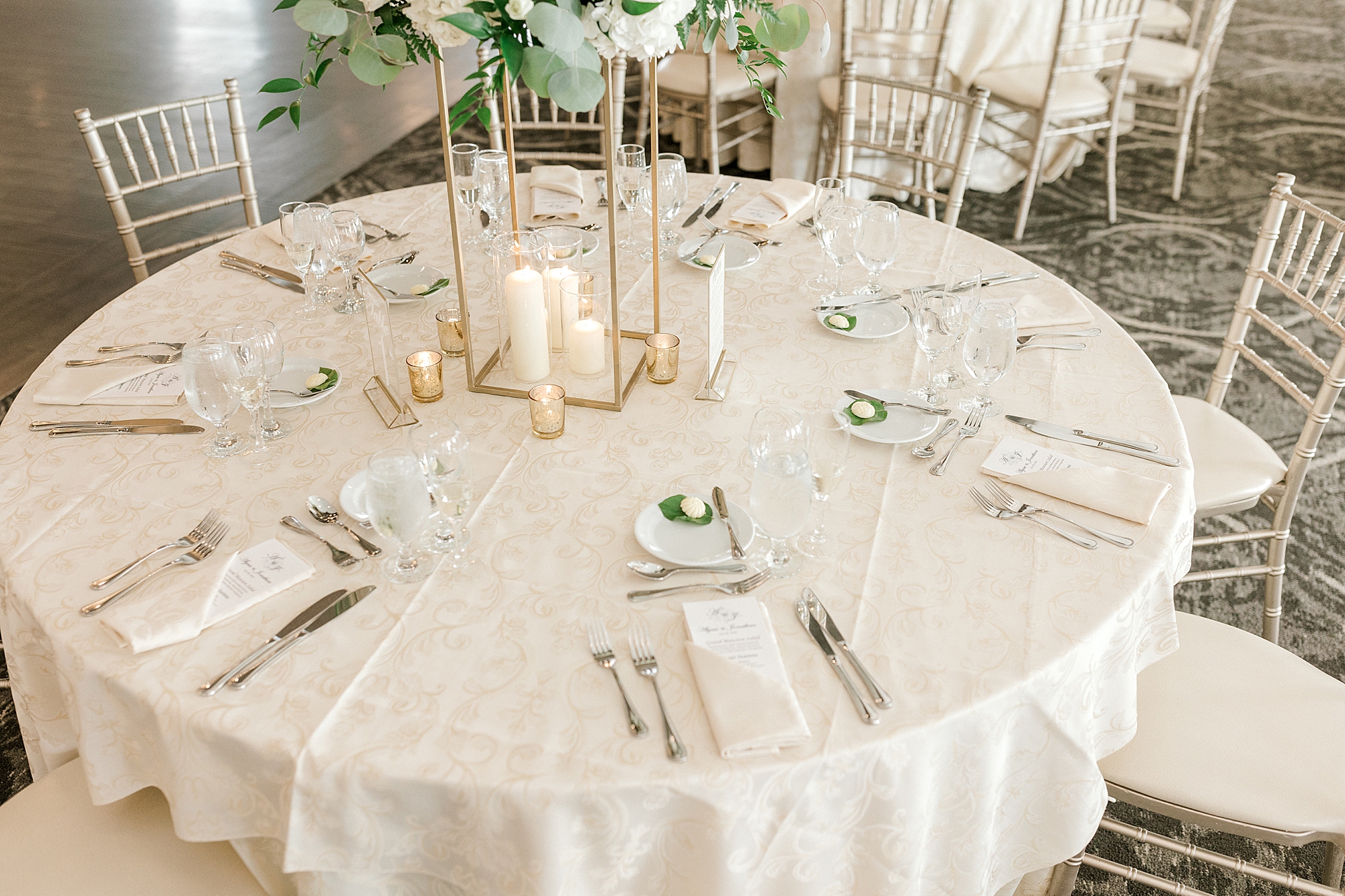 place setting with white napkins at wedding reception at the Mansion at Mountain Lakes