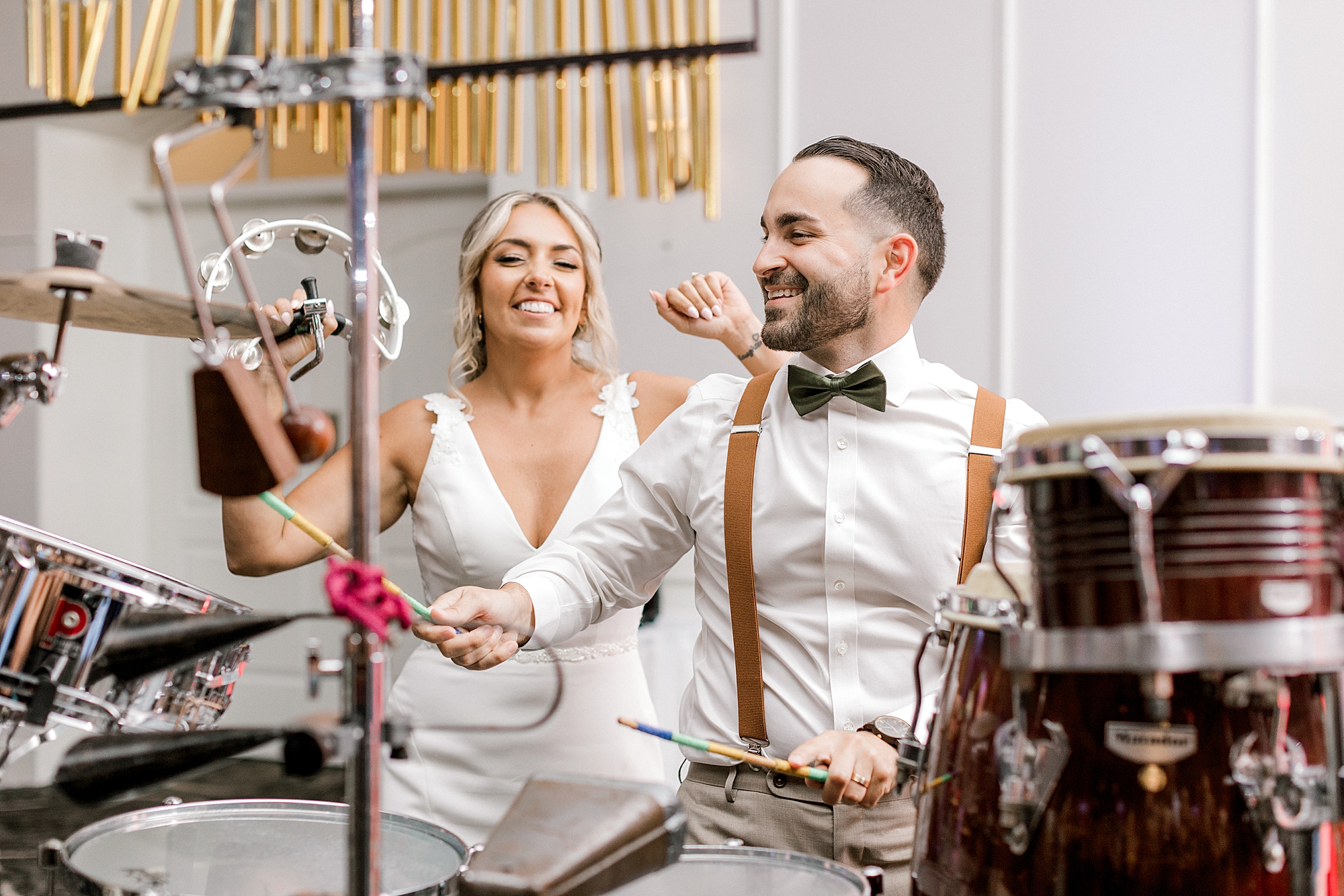 bride and groom dance and play percussion at Mountain Lakes NJ wedding reception