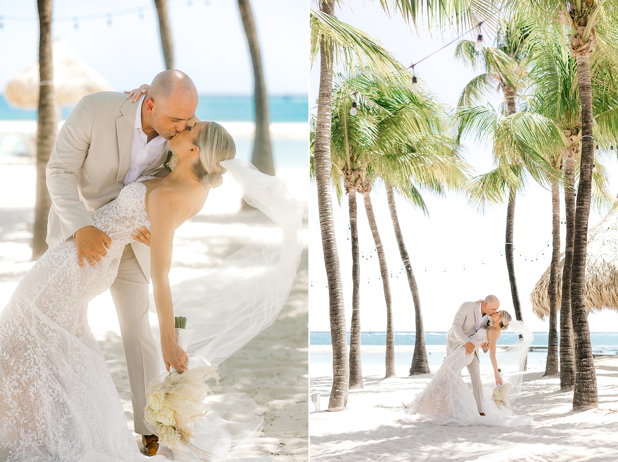 groom in tan suit dips bride under palm trees during Aruba wedding day