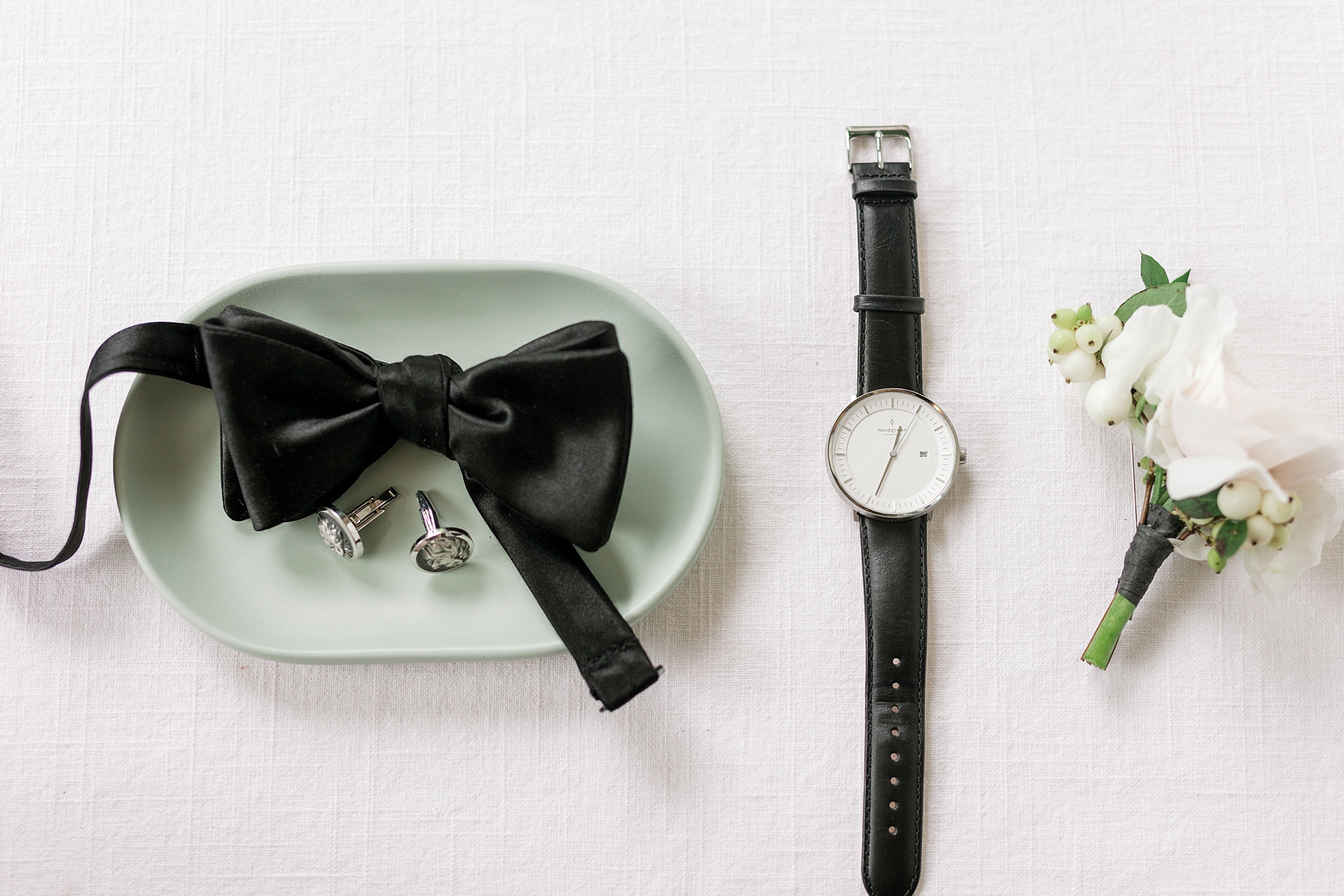 groom's black tie and watch for luxurious summer wedding