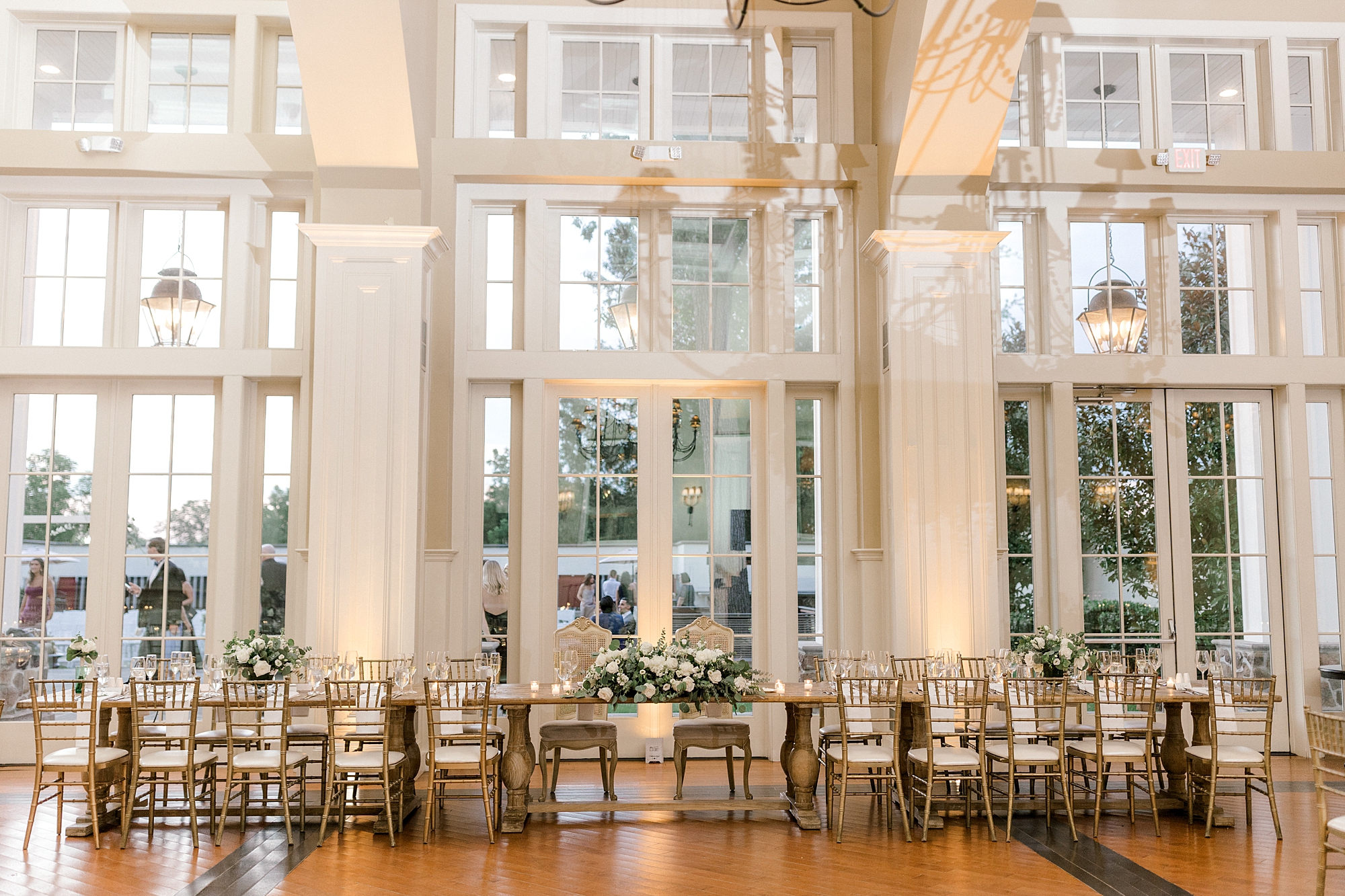 summer wedding reception at Ryland Inn with ivory and sage green details