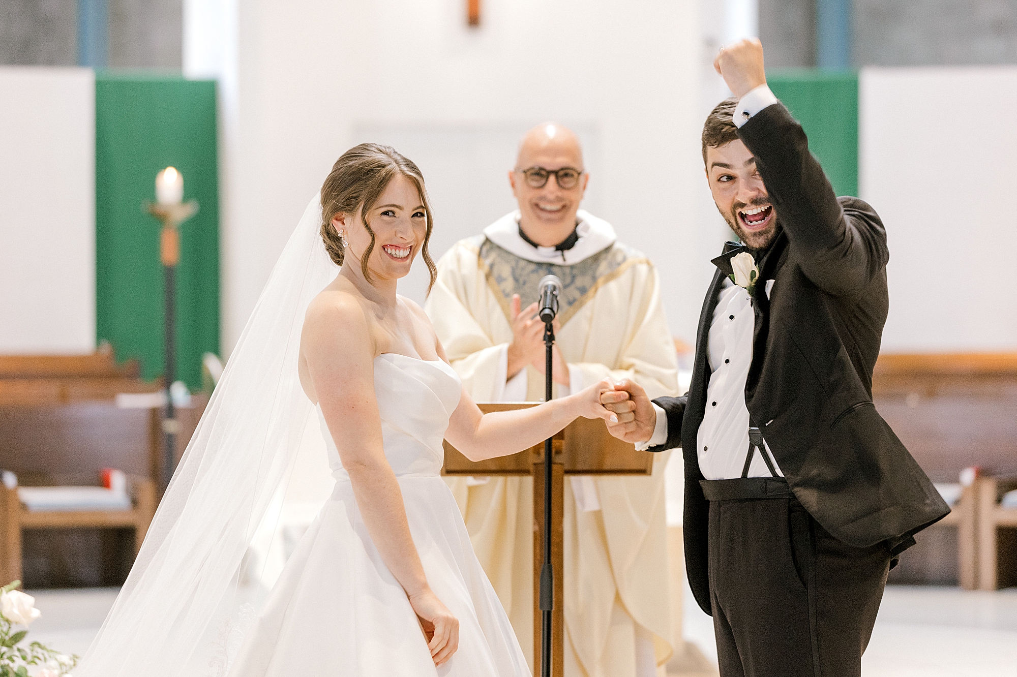 bride and groom laugh with guests during traditional church wedding in New Jersey