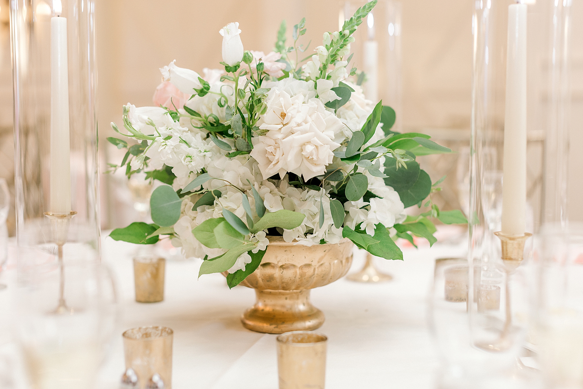 white and pink floral centerpiece at the Farmhouse