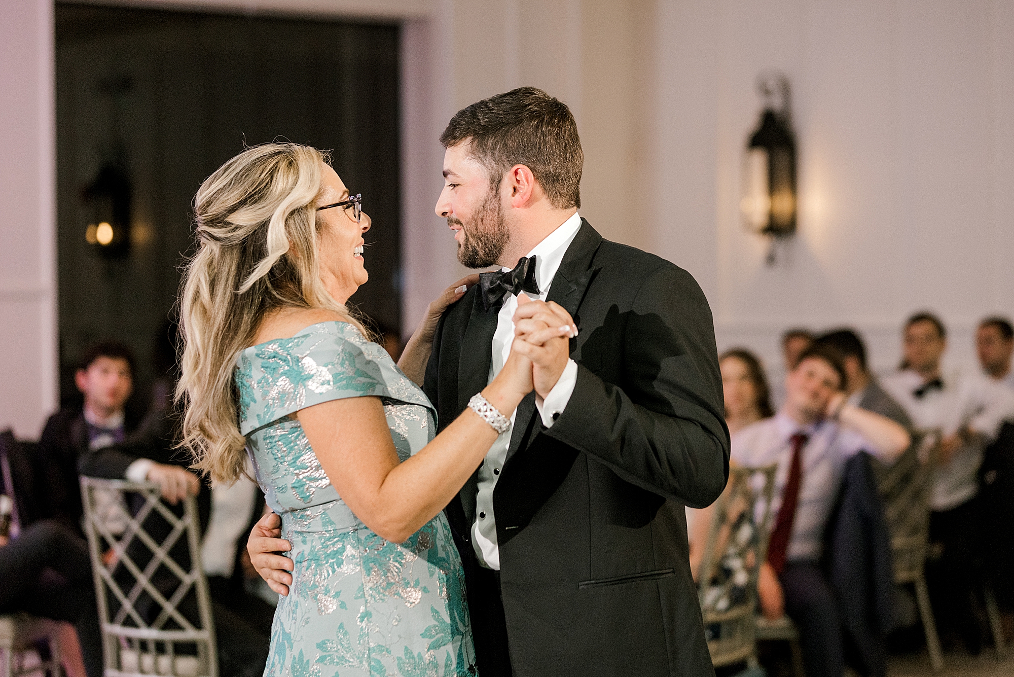 groom dances with mom during Hampton NJ wedding reception