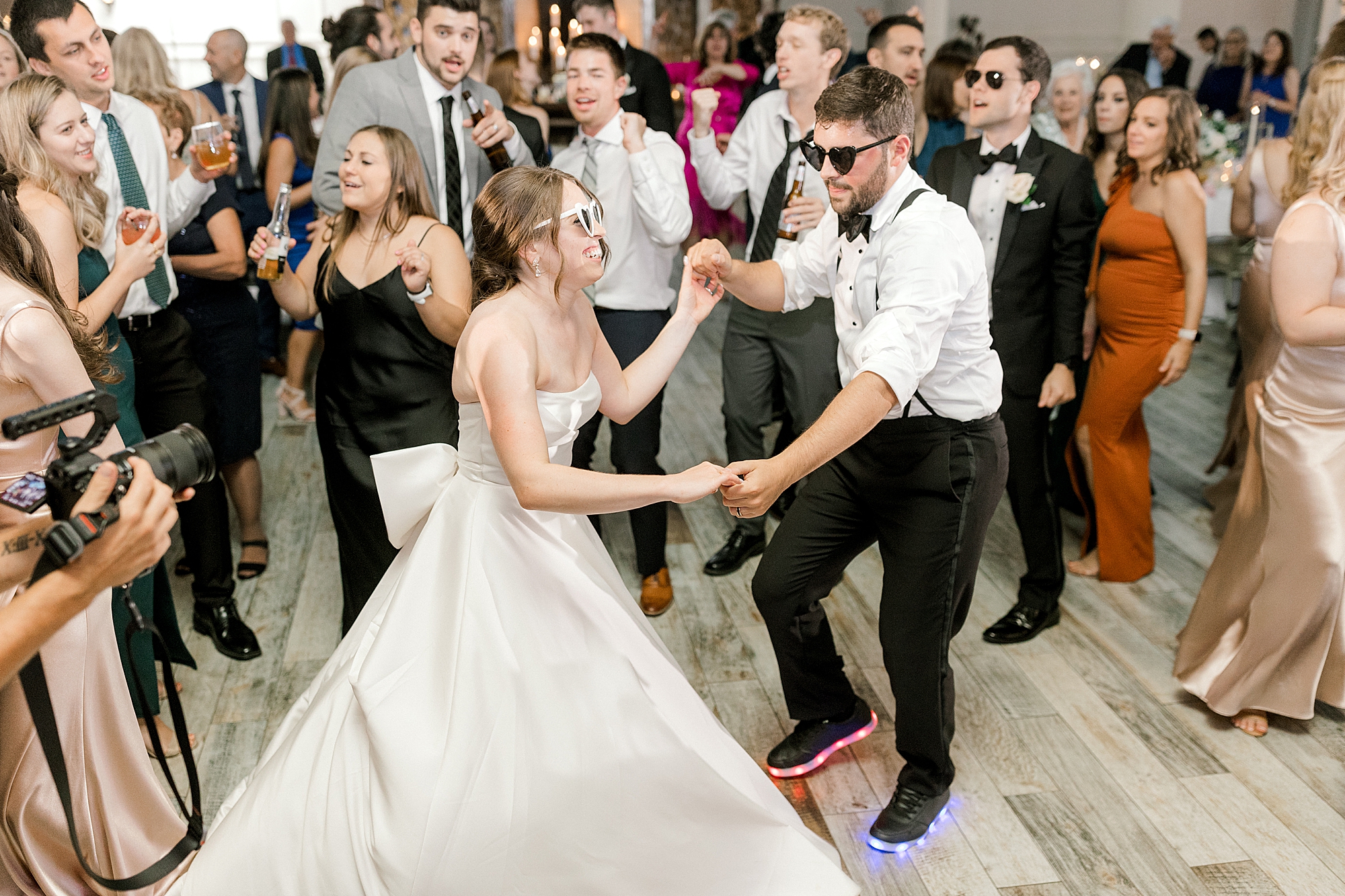 bride dances with guests during Hampton NJ wedding reception
