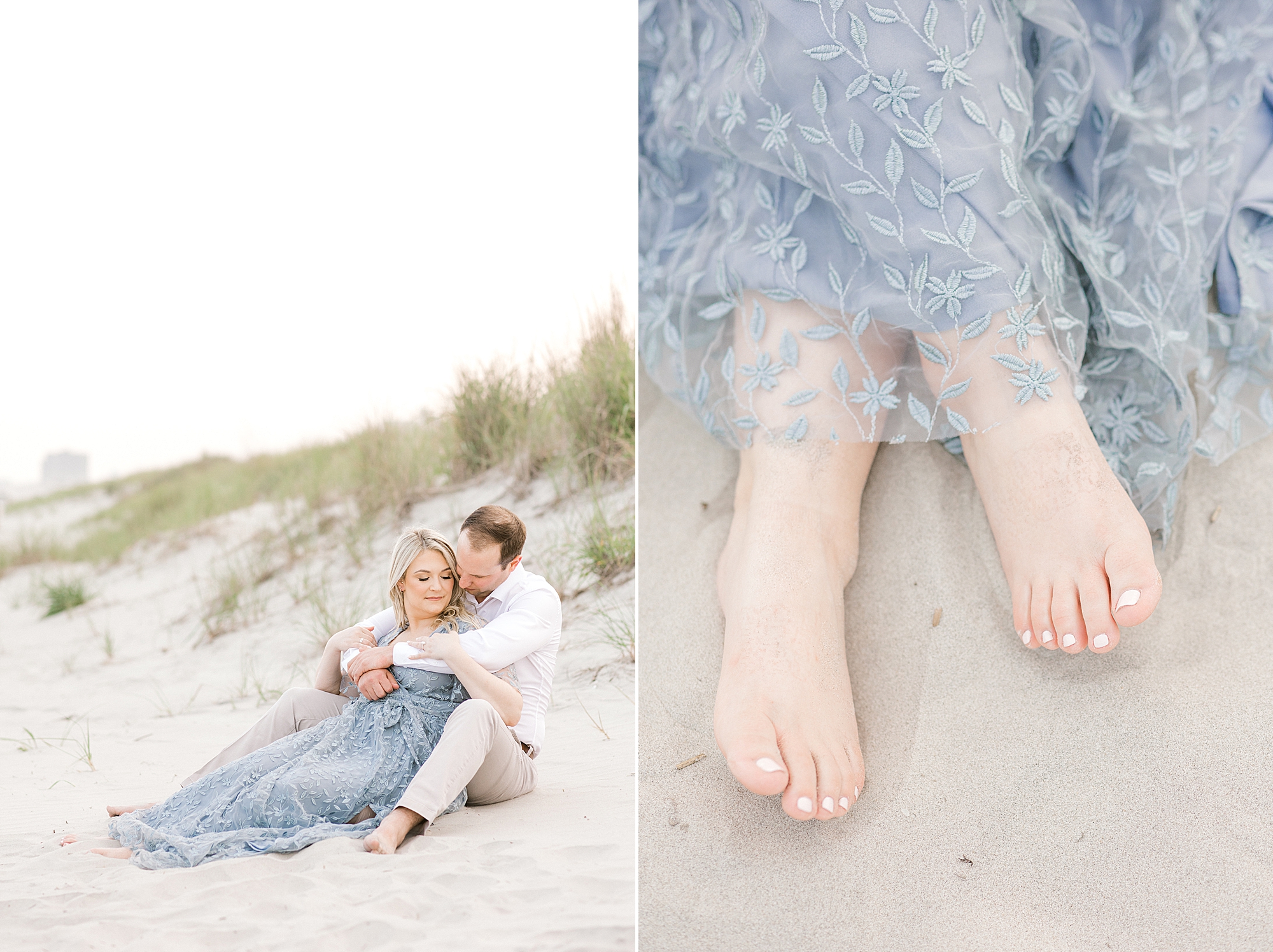 man sits hugging woman in blue lace dress from behind on beach in New Jersey