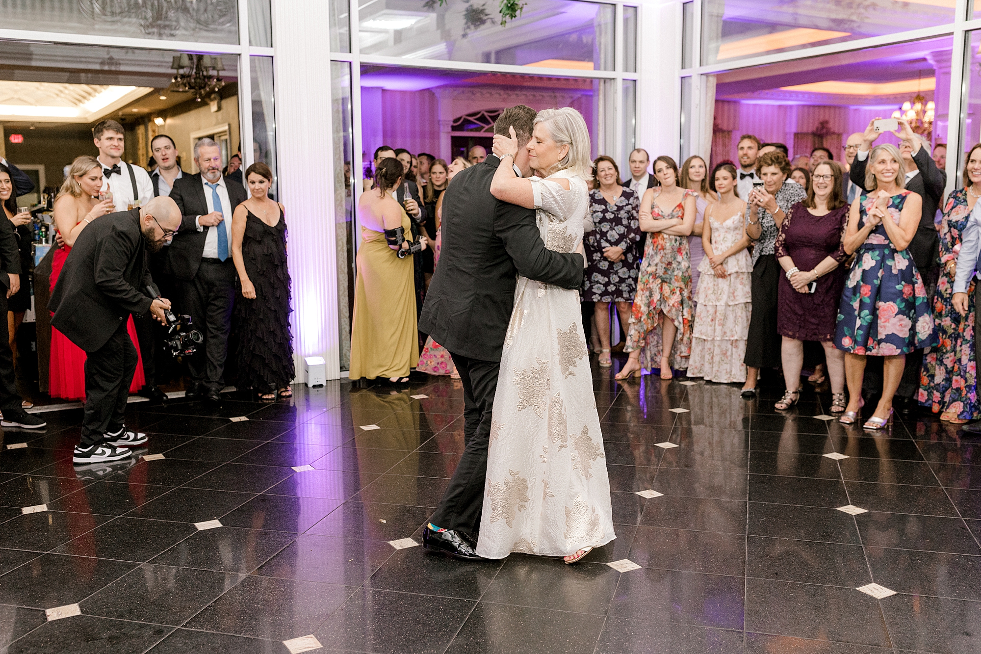 groom dances with mother during Long Beach Island wedding reception